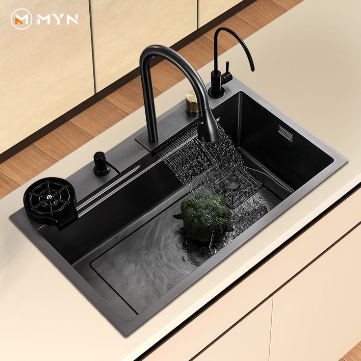 évier de cuisine moderne en acier inoxydable noir élégant avec accessoires
