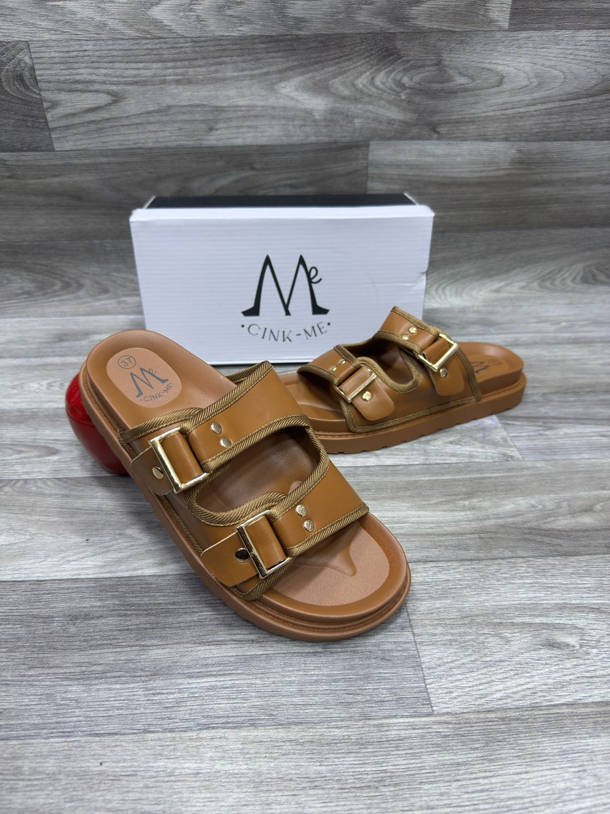 Mules à boucles