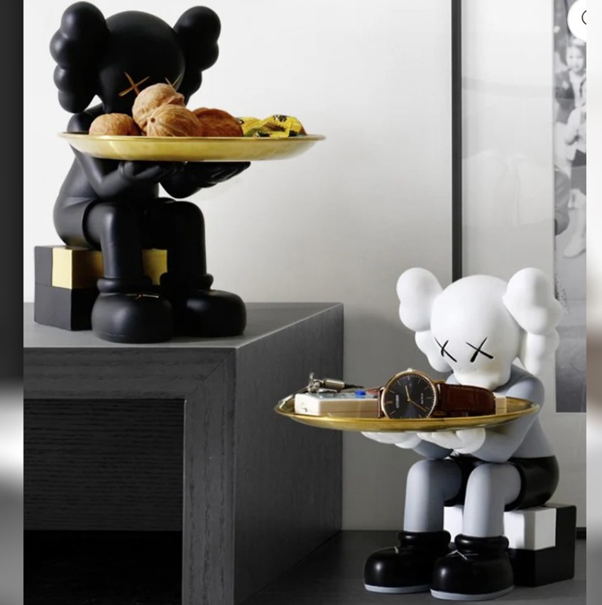 Seated KAWS